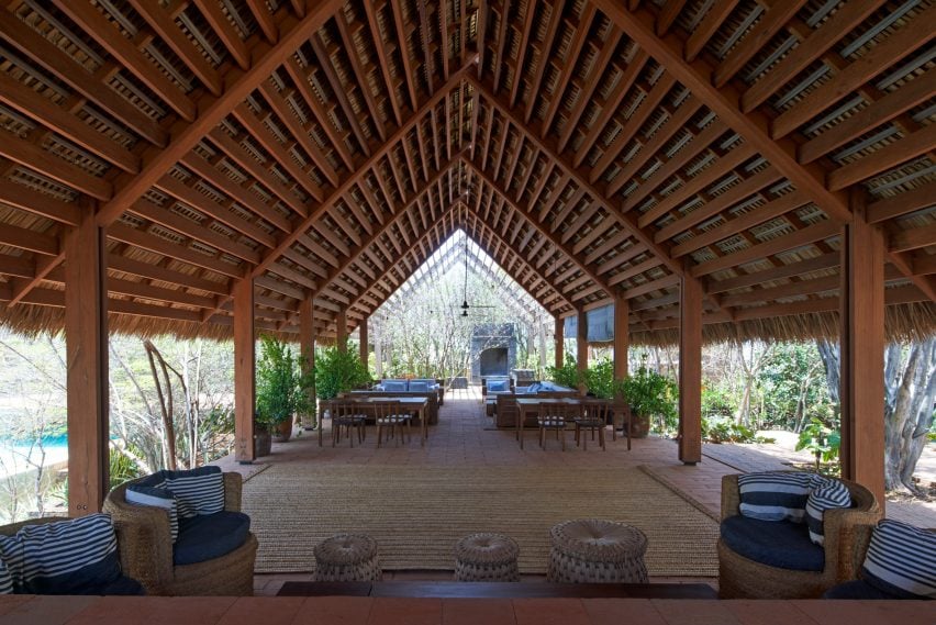 Cometa House is nestled within trees on coastal site in Oaxaca