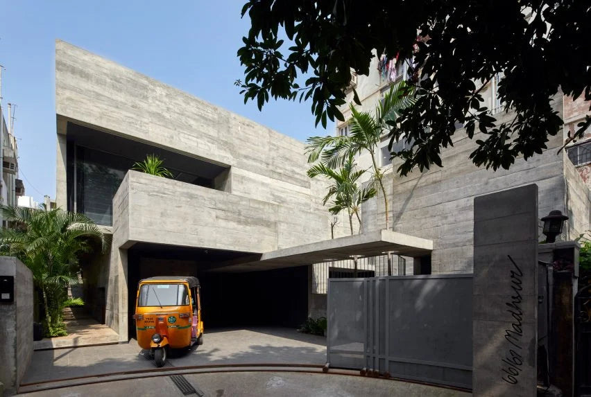 Matharoo Associates folds concrete home in India around courtyards