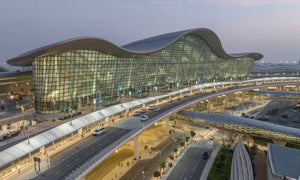 KPF tops Abu Dhabi airport with undulating roof informed by sand dunes